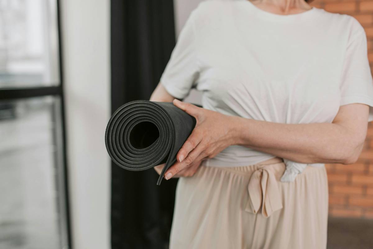 Infographic showing bacteria reduction on yoga mats: 99.9% with ecosense training vs. 60% with DIY vinegar spray vs. 85% with commercial cleaner